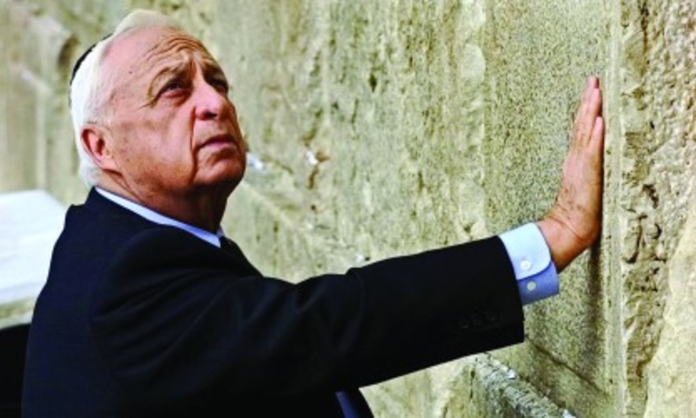 Ariel Sharon prays at the Western Wall in Jerusalem after being elected prime minister in 2001. /Jim Hollander/EPA